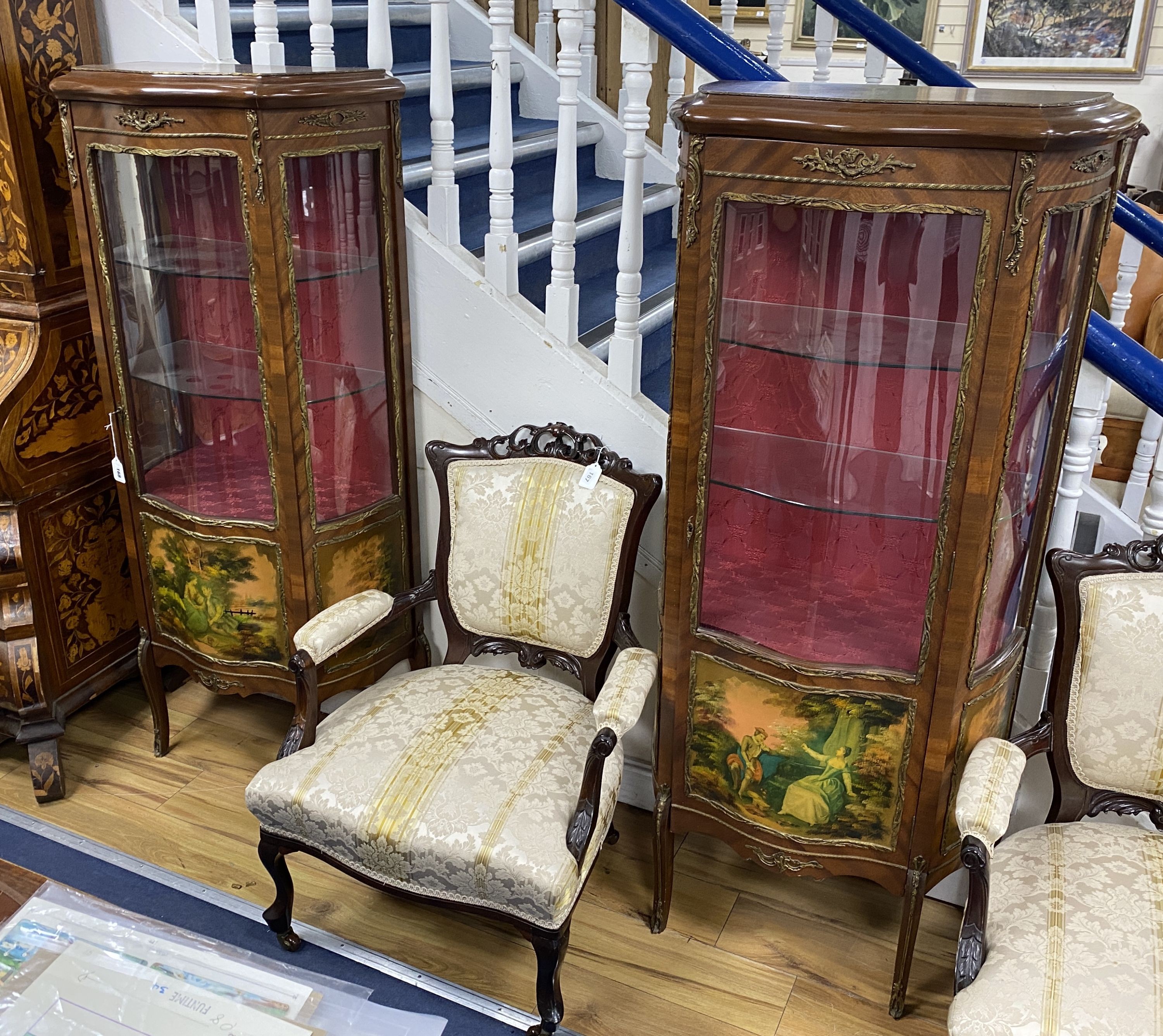 A pair of reproduction gilt metal mounted Vernis Martin style serpentine front vitrine, width 68cm, depth 36cm, height 152cm